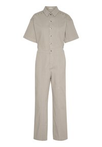 Beige kortärmad overall med knäppning framtill, axelstuds och rak ben-design. Tillverkad av ett slitstarkt tyg med en slät yta.