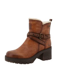 Bottine en cuir marron avec une surface texturée, doublure en fausse fourrure, sangle réglable avec boucle et talon épais pour le soutien.