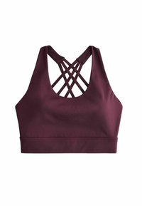 Bordeaux sportbh met een kruislings design aan de achterkant en een zachte textuur. Beschikt over een brede band aan de onderkant voor extra ondersteuning.
