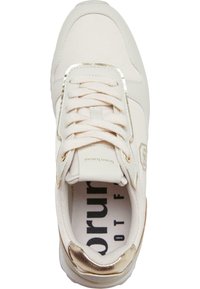 Lys beige sneaker laget av lerret med et gullakcent på hælen. Har runde snørebånd og en mønstret såle med merkevare.