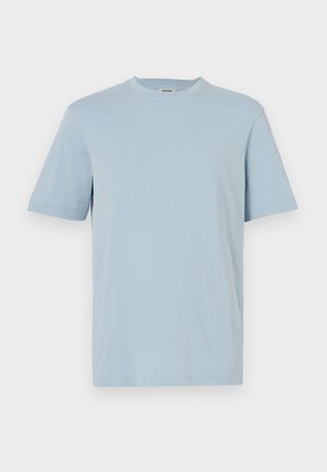 Light blue cotton t-shirt with a round neck, short sleeves, and a straight hem. Smooth texture and minimalist design, no patterns or accents.