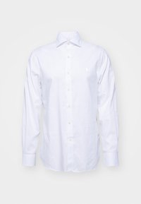 Biała koszula z długim rękawem zapinana na guziki, wykonana z bawełny. Posiada klasyczny kołnierzyk, dopasowane guziki oraz małe logo na lewej piersi.