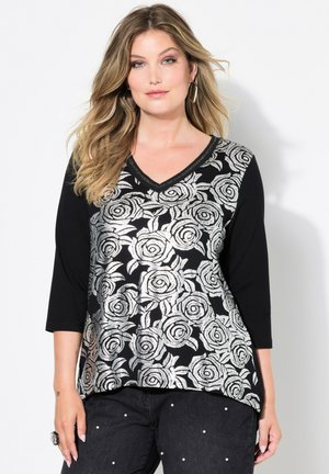 Haut noir et argent en V avec des manches trois-quarts, orné d'un motif floral de roses et d'un tissu doux et texturé. Design décontracté.