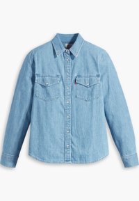 Vaaleansininen farkkupaita, jossa pitkät hihat, napitettu etuosa, kaksi rintataskua ja klassinen kaulus. Pehmeä materiaali ja rento istuvuus.