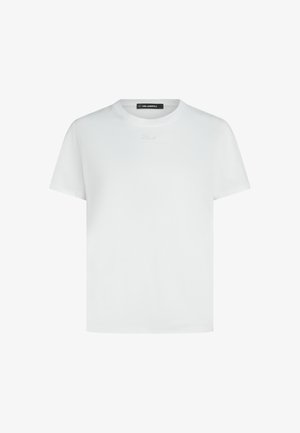 Fehér rövid ujjú, kerek nyakú póló, finom hímzett logóval a nyakkivágás alatt középen.
