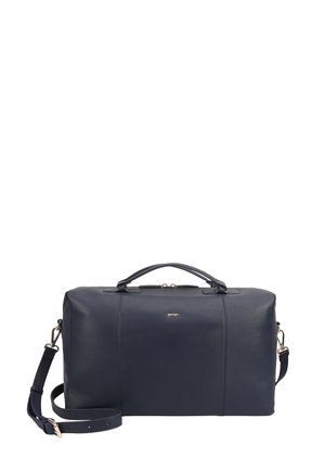 Sac de voyage en cuir bleu marine avec poignées supérieures, bandoulière réglable et petit logo métallique au centre avant.
