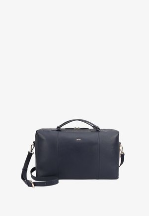 Donkerblauwe leren duffeltas met bovenhandvatten, verstelbare schouderriem en een klein metalen logo in het midden van de voorkant.