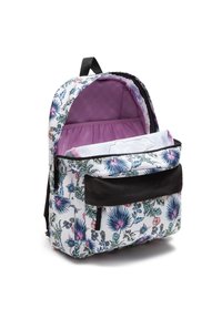 Plecak z kwiatowym wzorem i czarną kieszenią z przodu, wnętrze wyłożone fioletowym materiałem, częściowo otwarty z złożonym materiałem w środku.