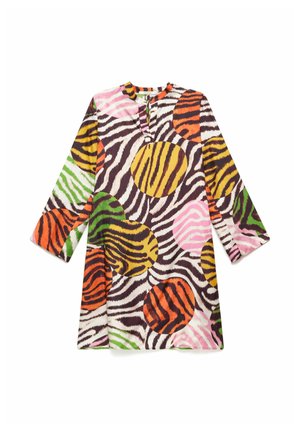 Long-sleeve tunic dress with multicolored zebra stripes and large circular patterns in orange, yellow, pink, and green on white background.