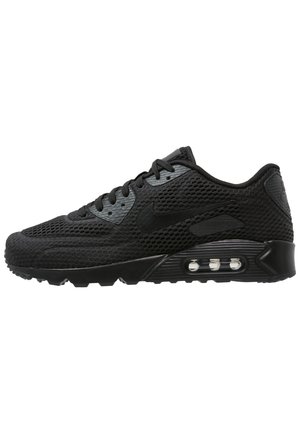 Schwarzer Nike Air Max Sneaker mit Mesh-Obermaterial, sichtbarer Luftdämpfung in der Sohle und schwarzem Swoosh-Logo an der Seite, Ansicht von der linken Seite.
