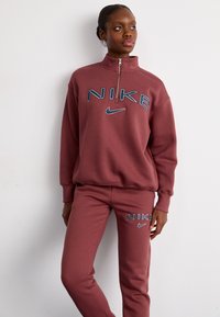 Nike Sportswear LOGO - Tepláky - red sepia