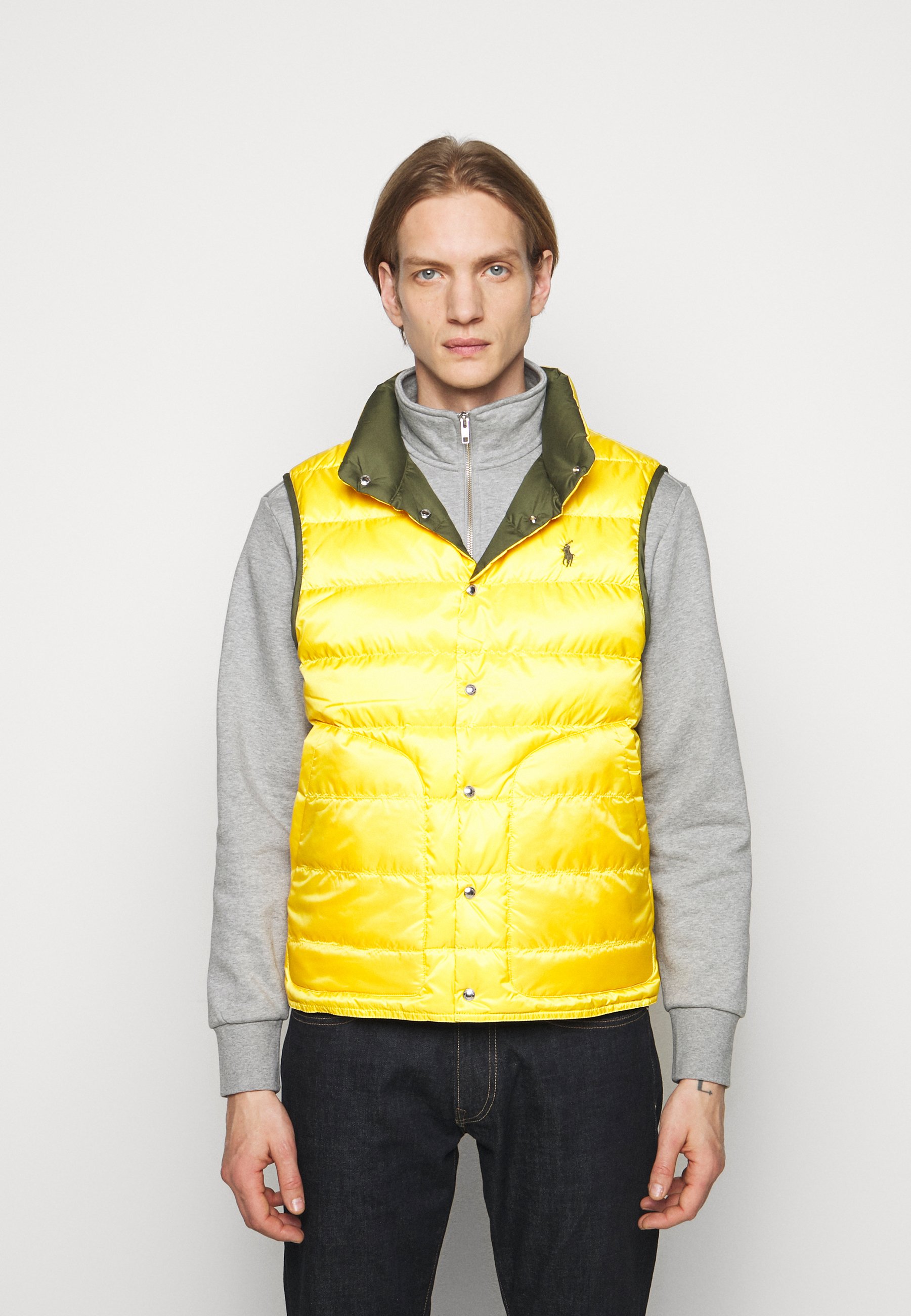 yellow polo vest