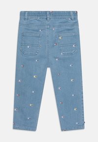 Tommy Hilfiger BABY FUN ALLOVER PRINT PANTS UNISEX - Relaxed fit -farkut - blue denim