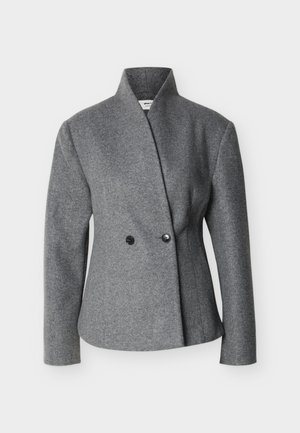 Hall halli ebaühtlane villane bleiser kõrge krae, pikkade varrukatega ja kahe musta nupuga ees.