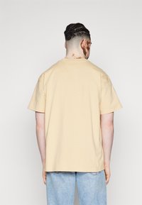 Carhartt WIP AMERICAN SCRIPT - T-shirt basic - rattan