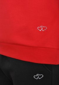 Navigazione Sweater - rot