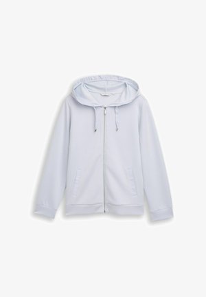 Sweat à capuche gris clair zippé avec cordon de serrage à la capuche, manches longues et deux poches avant, présenté sur un fond blanc.