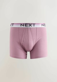Boxers pour hommes violet clair avec une ceinture blanche arborant le logo noir NEXT, présentés sur un fond clair uni.