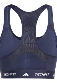 Marine sportbeha met een mesh racerback ontwerp. Bevat een brede elastische band met de tekst "TECHFIT" in het wit. Gladde, gestructureerde stof.