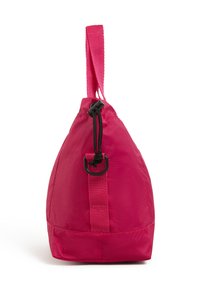 Rosa Nylon-Zugbeutel mit runder Form, strukturiertem Oberflächen und einem oberen Griff. Mit schwarzen Kordel- und Hardware-Akzenten ausgestattet.