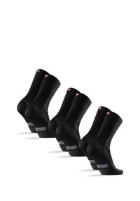 Calcetines negros con un diseño liso, puños acanalados y letras blancas en la suela. Cada uno tiene un pequeño logotipo de la bandera suiza en el puño.