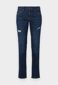 Mørkeblå denimjeans med rett snitt, med slitte hull ved knærne, tradisjonelle lommer og synlige kontraststing.