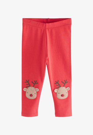 Leggings rouges pour enfants avec des visages de rennes et des bois brodés sur les genoux.