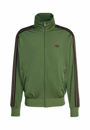 Green zip-up jacket made of smooth fabric with a high collar, featuring dark red stripes along the sleeves and an embroidered logo on the chest.