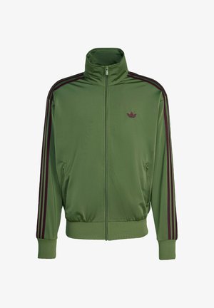 Green zip-up jacket made of smooth fabric with a high collar, featuring dark red stripes along the sleeves and an embroidered logo on the chest.