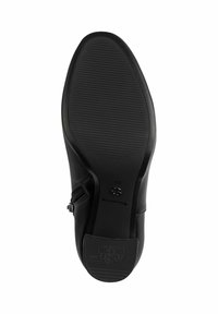 Talpa de pantof negru cu suprafață din cauciuc texturat și logo gravat, având o formă rotunjită și un detaliu cu fermoar pe lateral.