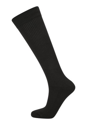 Chaussette noire haute jusqu'au genou avec texture côtelée isolée sur fond blanc.