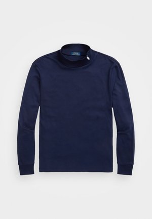 Dunkelblaues langärmeliges Rollkragenoberteil mit elastischen Bündchen, aus weichem Stoff. Verfügt über ein kleines weißes Logo am Kragen. Schlichtes Design.