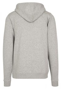 Grijze hoodie met lange mouwen, gemaakt van zachte stof. Heeft een eenvoudig ontwerp met een buidelzak en geribde manchetten.