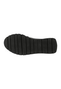 Suola di scarpa in gomma nera con scanalature orizzontali, caratterizzata da una superficie texturizzata e un design leggermente curvo, lunga circa 30 cm.