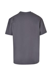 Šedé bavlněné tričko s kulatým výstřihem a krátkými rukávy, s jednoduchým designem a uvolněným střihem. Jemná textura bez viditelných log.