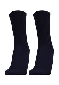 Navy blue cotton socks with ribbed texture, crew length, and reinforced toe and heel. Designed for durability and comfort.