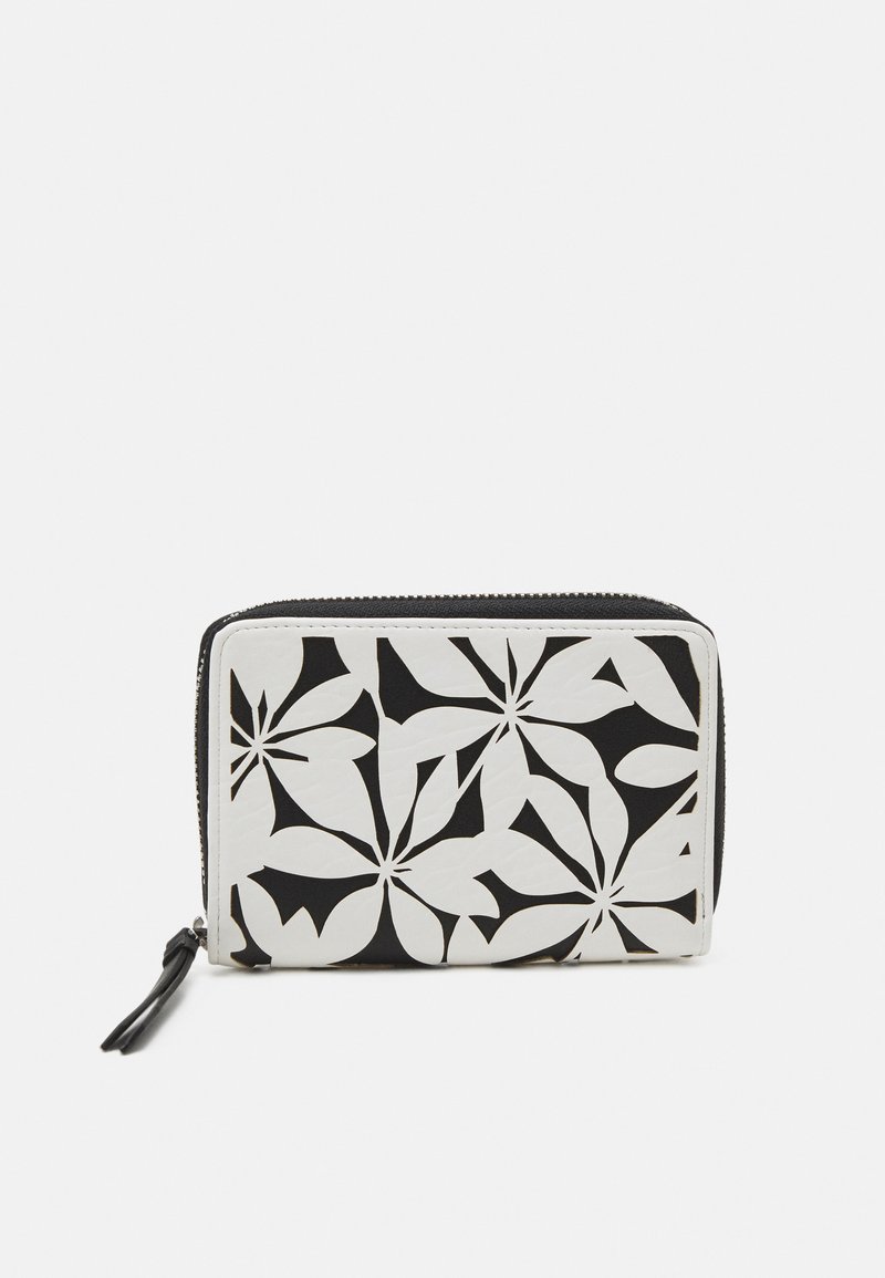 Portefeuille noir et blanc avec un design en découpes florales, texture lisse et fermeture éclair avec un petit accent en pompon.