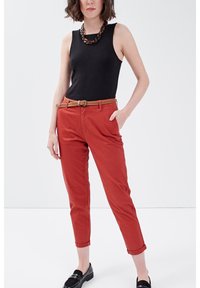 Cache Cache Pantalones chinos - orange foncé