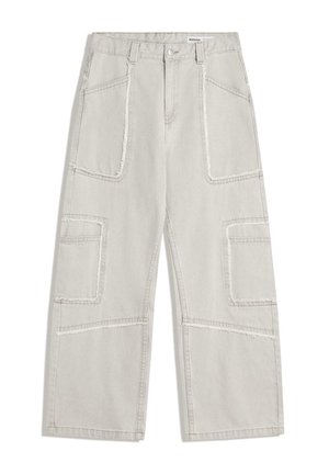 Light beige wide-leg jeans with large patch pockets and frayed seam details on the front and knees.