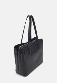 Black leather tote bag with two long handles and a central zippered compartment, shown against a plain white background.