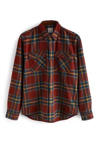 Chemise en flanelle à carreaux rouge et marine avec manches longues, col boutonné, deux poches poitrine et ourlet incurvé. Texture douce.