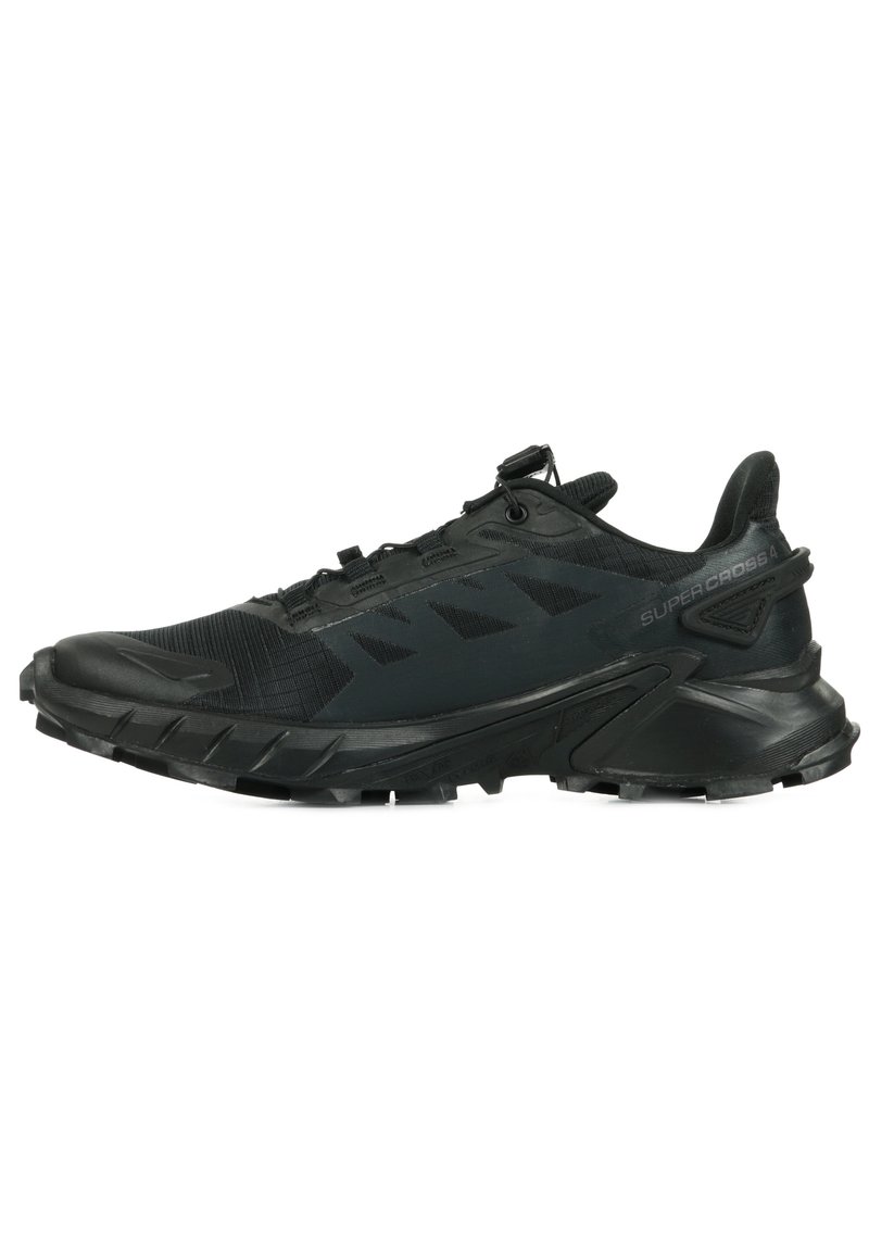 Black running shoe with mesh upper, textured overlays, reinforced toe, and cushioned sole. Features a quick-lace system and aggressive tread pattern.