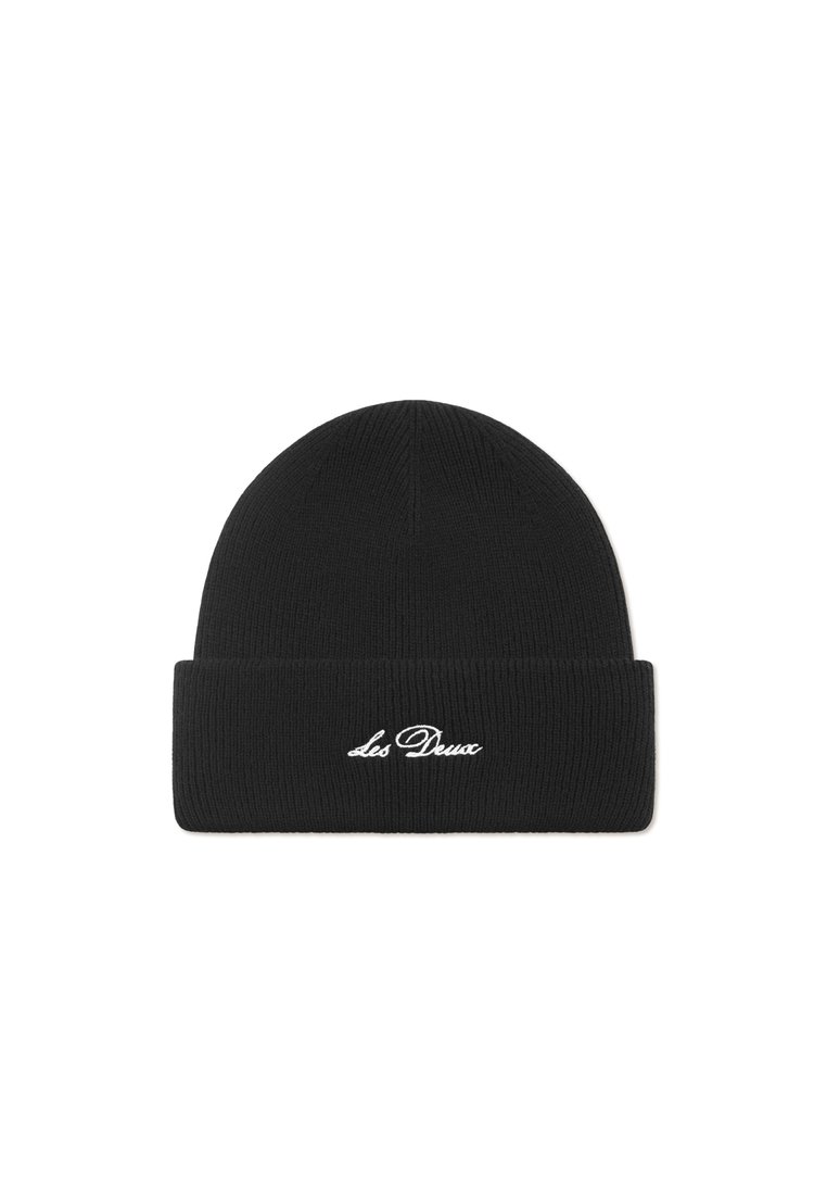 Black knitted beanie with a folded cuff and white embroidered "Les Deux" branding on the front. Smooth texture, rounded top shape.