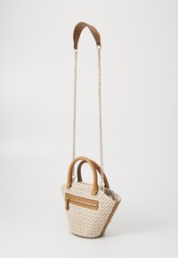Tan and cream patterned handbag with dual handles and a detachable chain strap. Features a zippered front pocket for added storage.