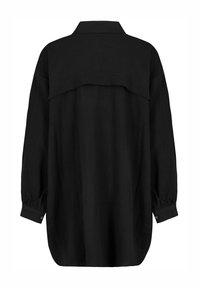Black long-sleeve shirt with a relaxed fit, featuring a layered back yoke, button cuffs, and a textured fabric.