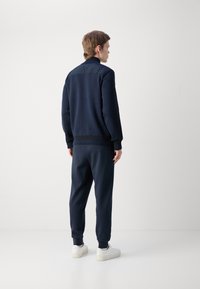 BOSS DARMANDO - Lengva striukė - dark blue