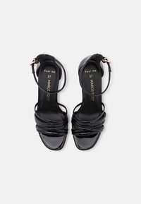Sandales à talons hauts noires brillantes pour femmes avec plusieurs brides à l'avant et fermeture à boucle à la cheville, taille 37.