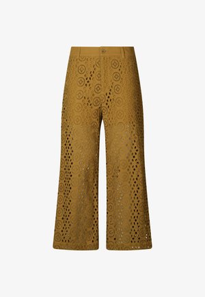 Pantaloni senape a pezzo unico con design a gamba ampia, caratterizzati da motivi circolari su tutta la superficie. Texture liscia e chiusura anteriore con bottone.