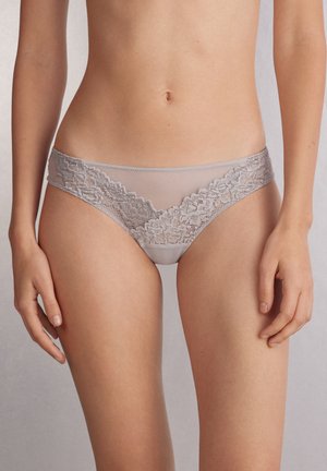 Gray lace panties featuring sheer panels, floral pattern accents, a smooth waistband, and minimalistic design. Soft texture visible.