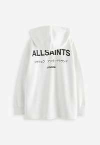 Bijela dukserica s kapuljačom koja ima veliki crni natpis "ALLSAINTS" i manji natpis na japanskom te "LONDON" na leđima. Mekani materijal, regularni kroj.
